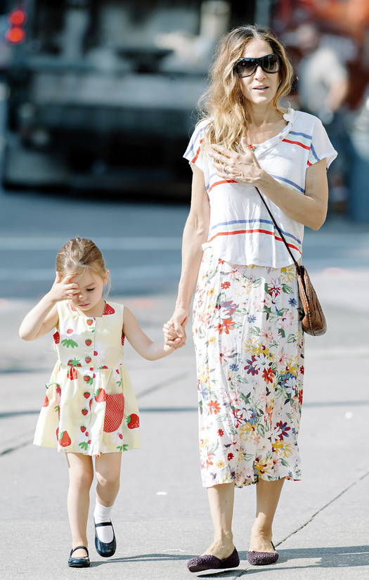 Sarah Jessica Parker seen wearing stripes and floral print dress while taking her twin daughters Marion and Tabitha to school in NYC. Pictured: Sarah Jessica Parker and Tabitha Broderick Ref: SPL553435  300513   Picture by: Jason Webber / Splash News Splash News and Pictures Los Angeles:	310-821-2666 New York:	212-619-2666 London:	870-934-2666 photodesk@splashnews.com 